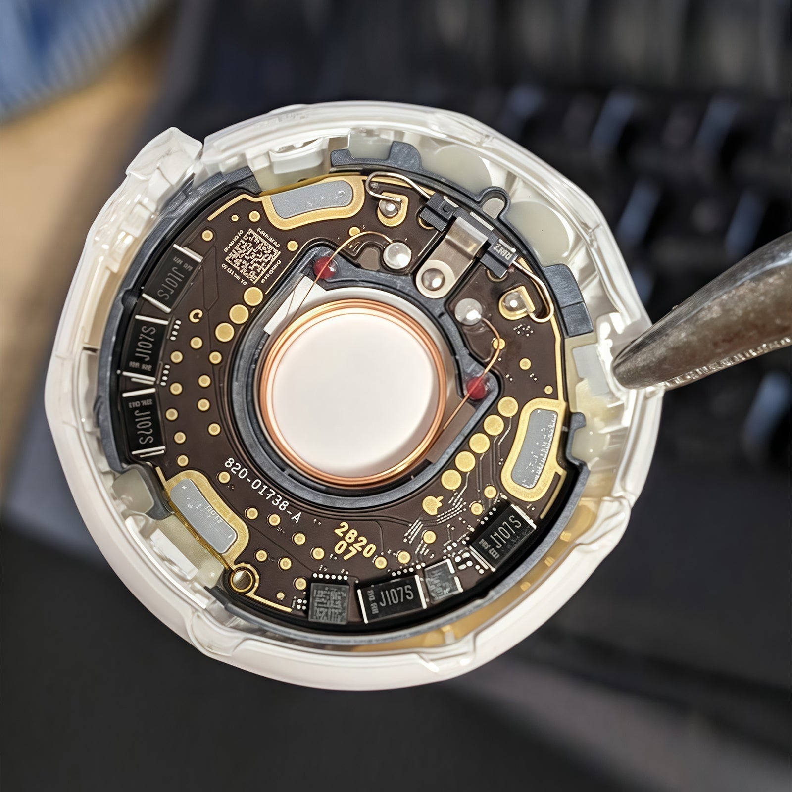 Huaqiangbei AirTag Phone Cases: A Reverse Engineering Report on Tracking Chips