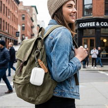 AirPods Pro 3 Case - Lifestyle clipped to backpack