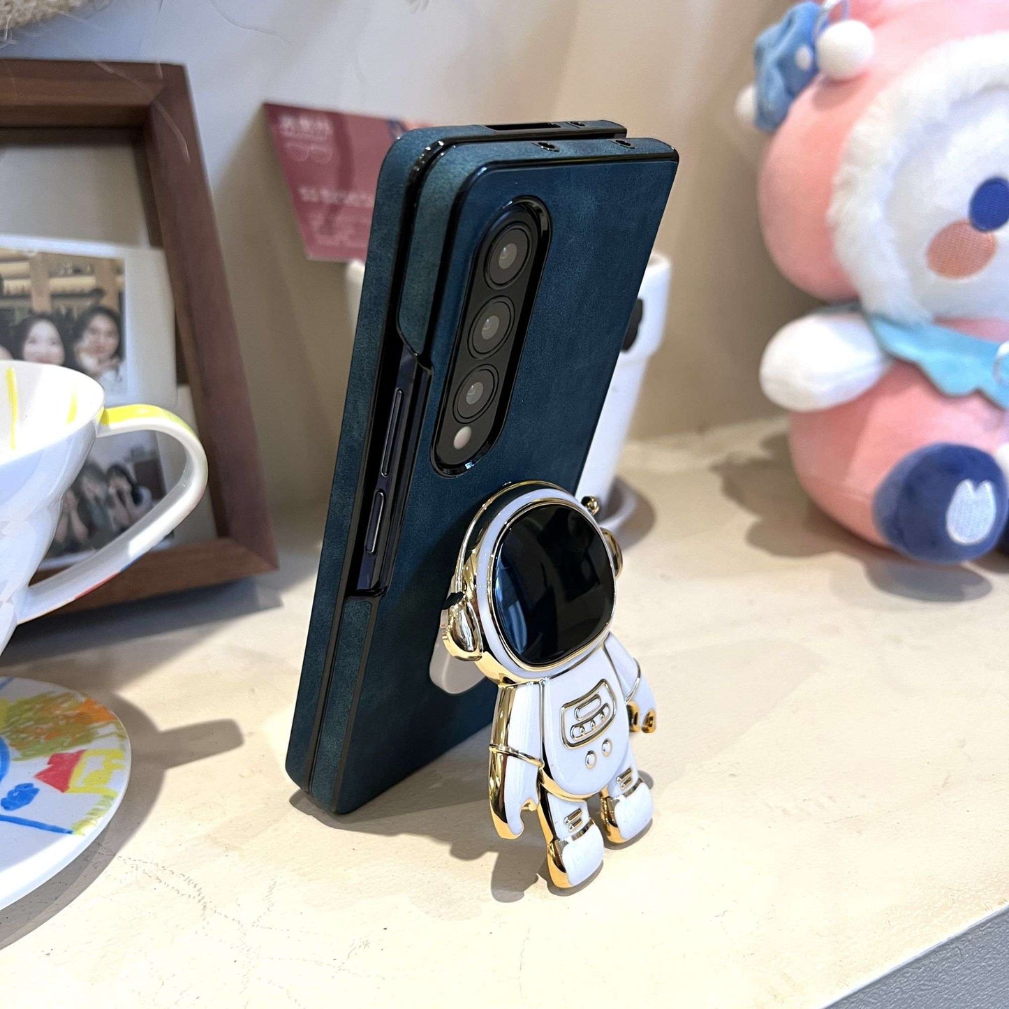 Luxurious and Fashionable Astronaut Stand Phone Case for Samsung Galaxy Z Fold 4 and Galaxy Z Fold 3.